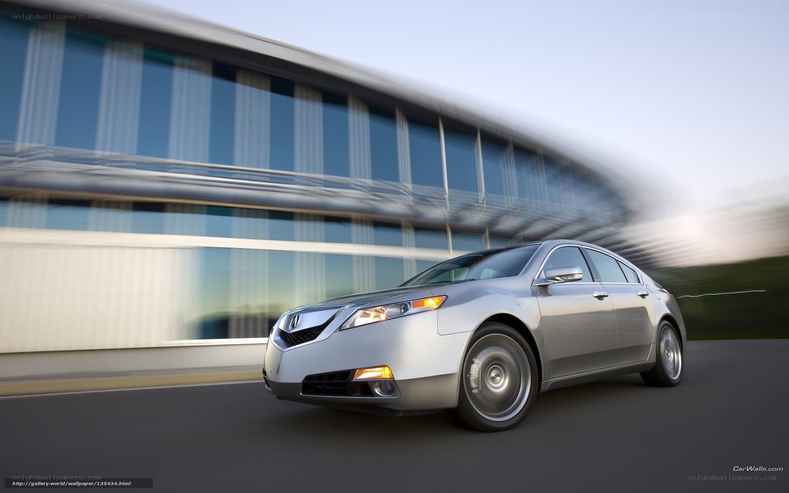 Silver Acura TL in motion