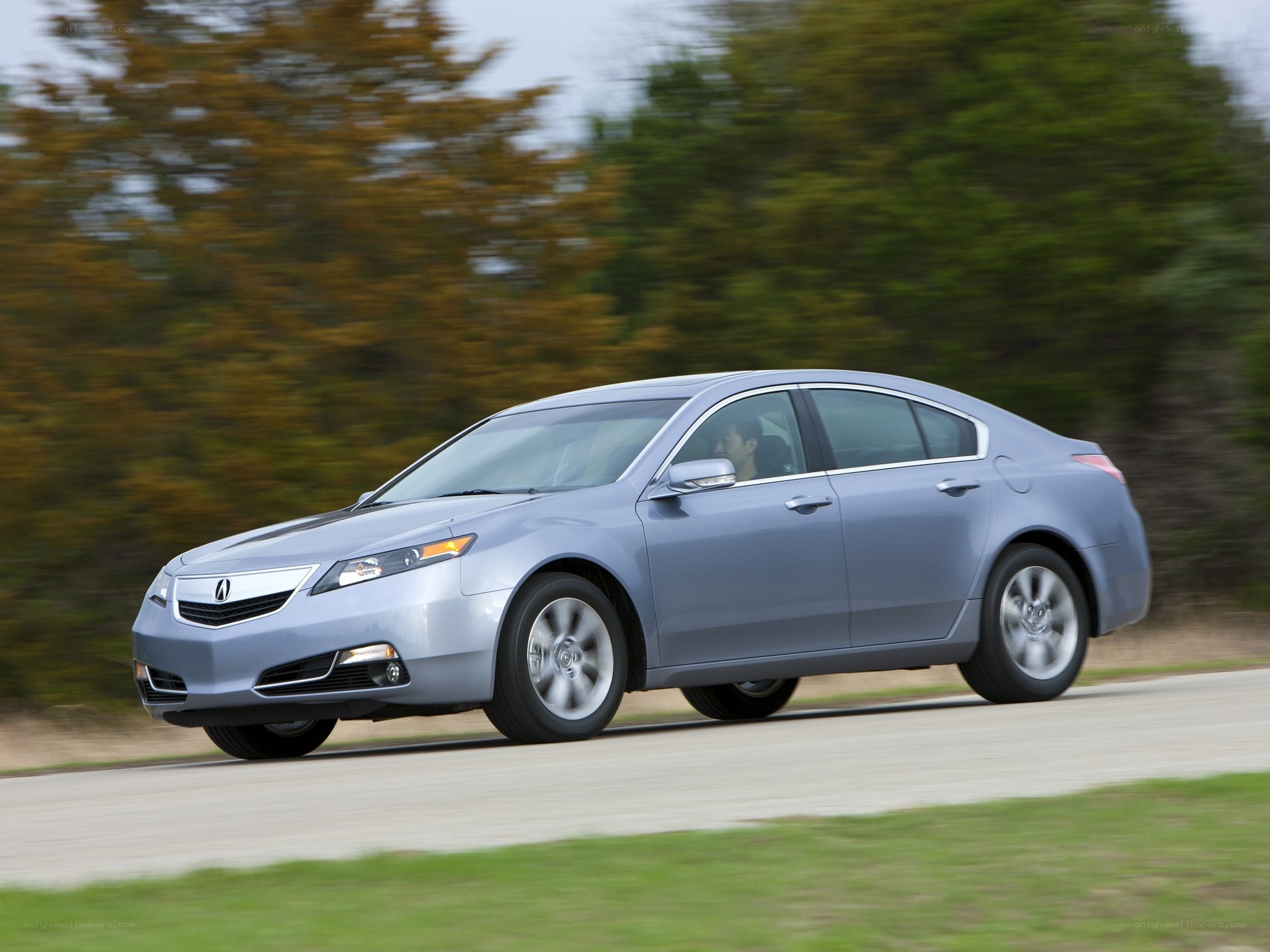 silver acura tl in motion