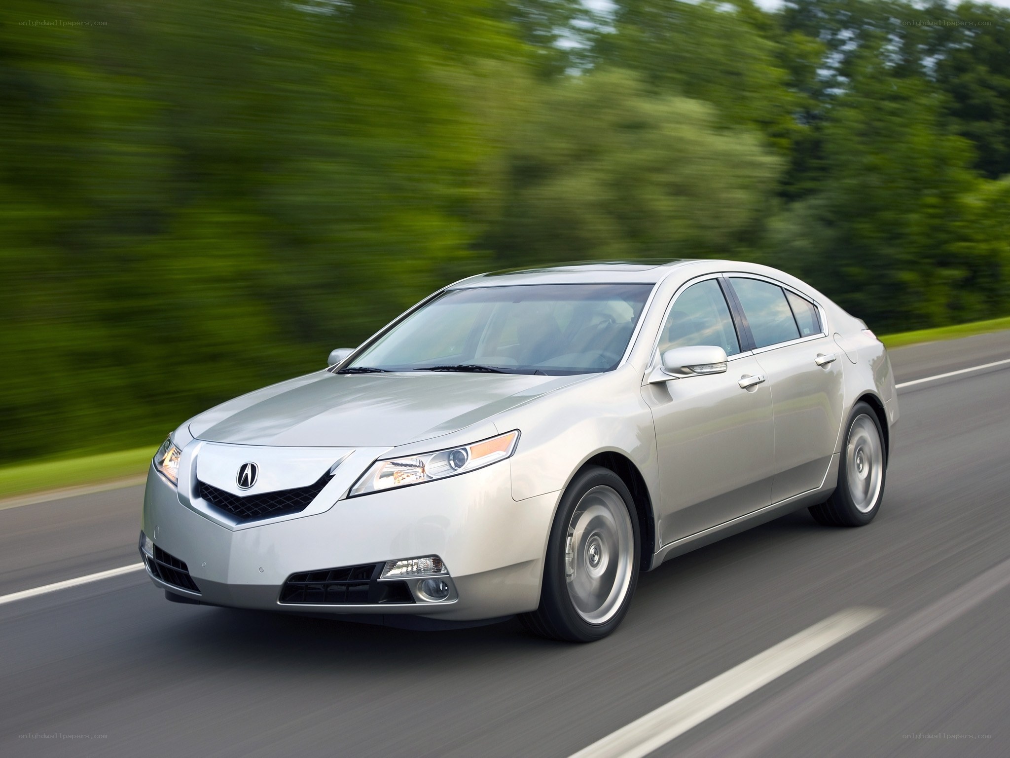 silver acura tl in motion