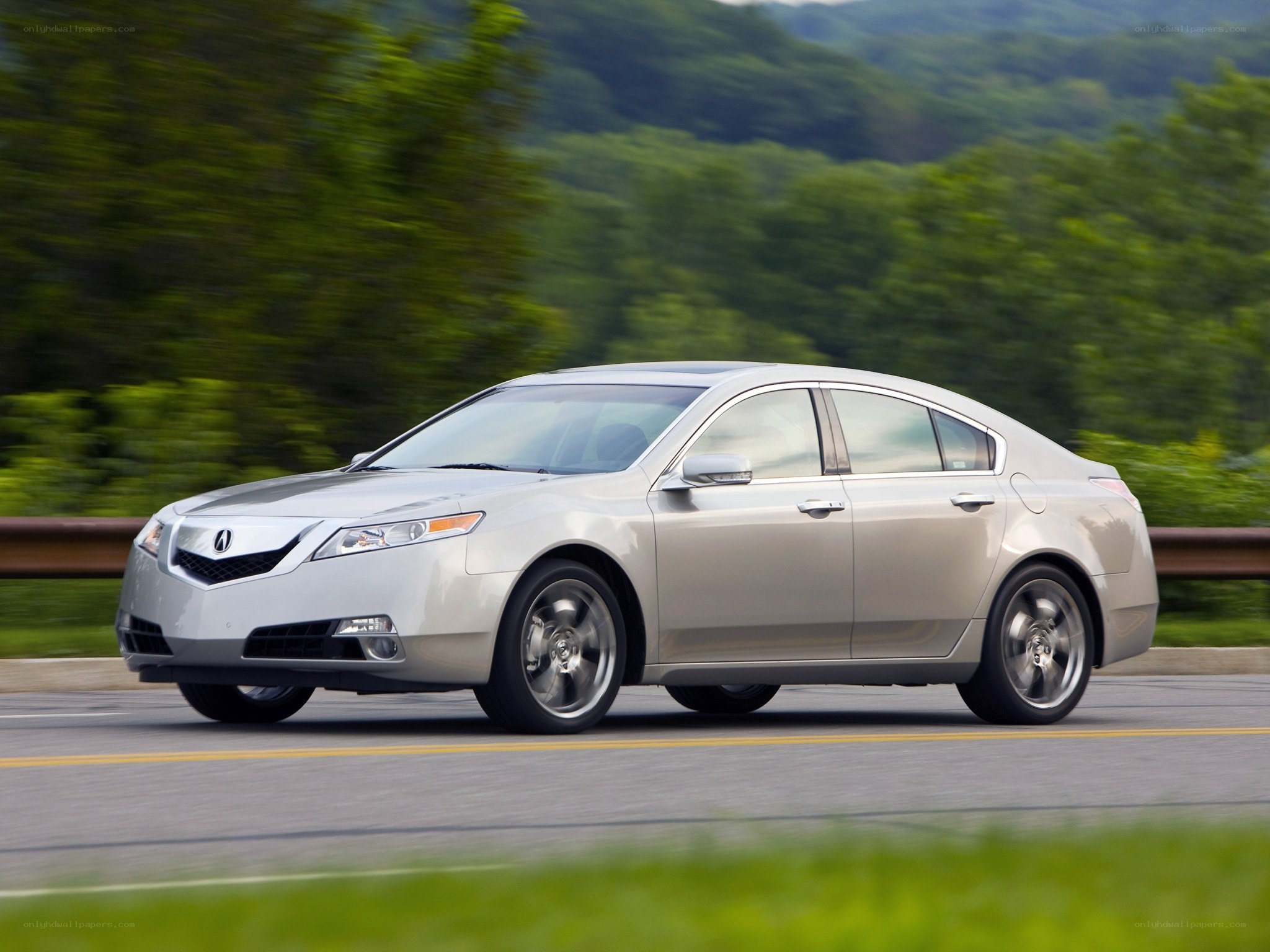 silver acura tl in motion