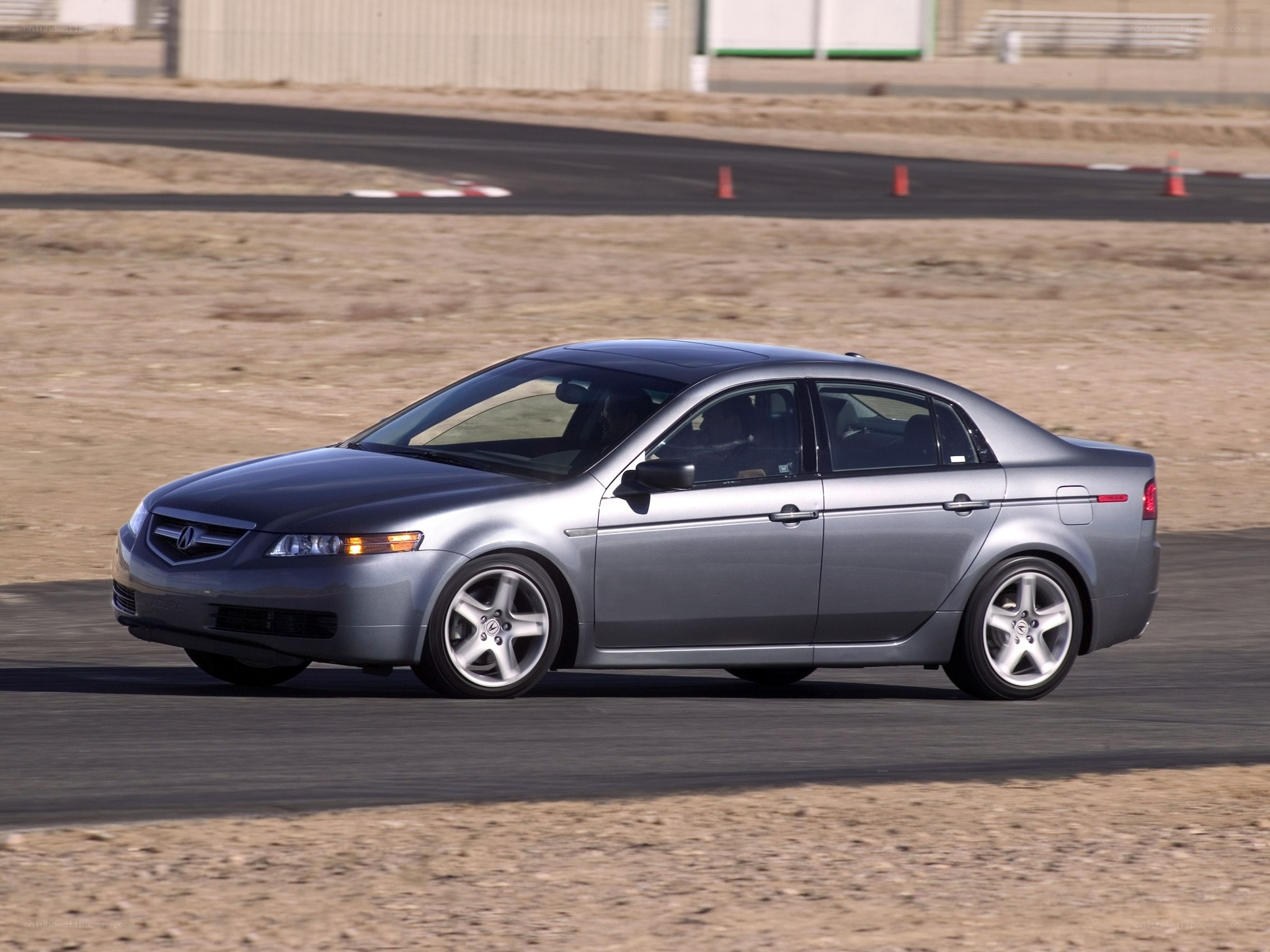 silver acura tl on track