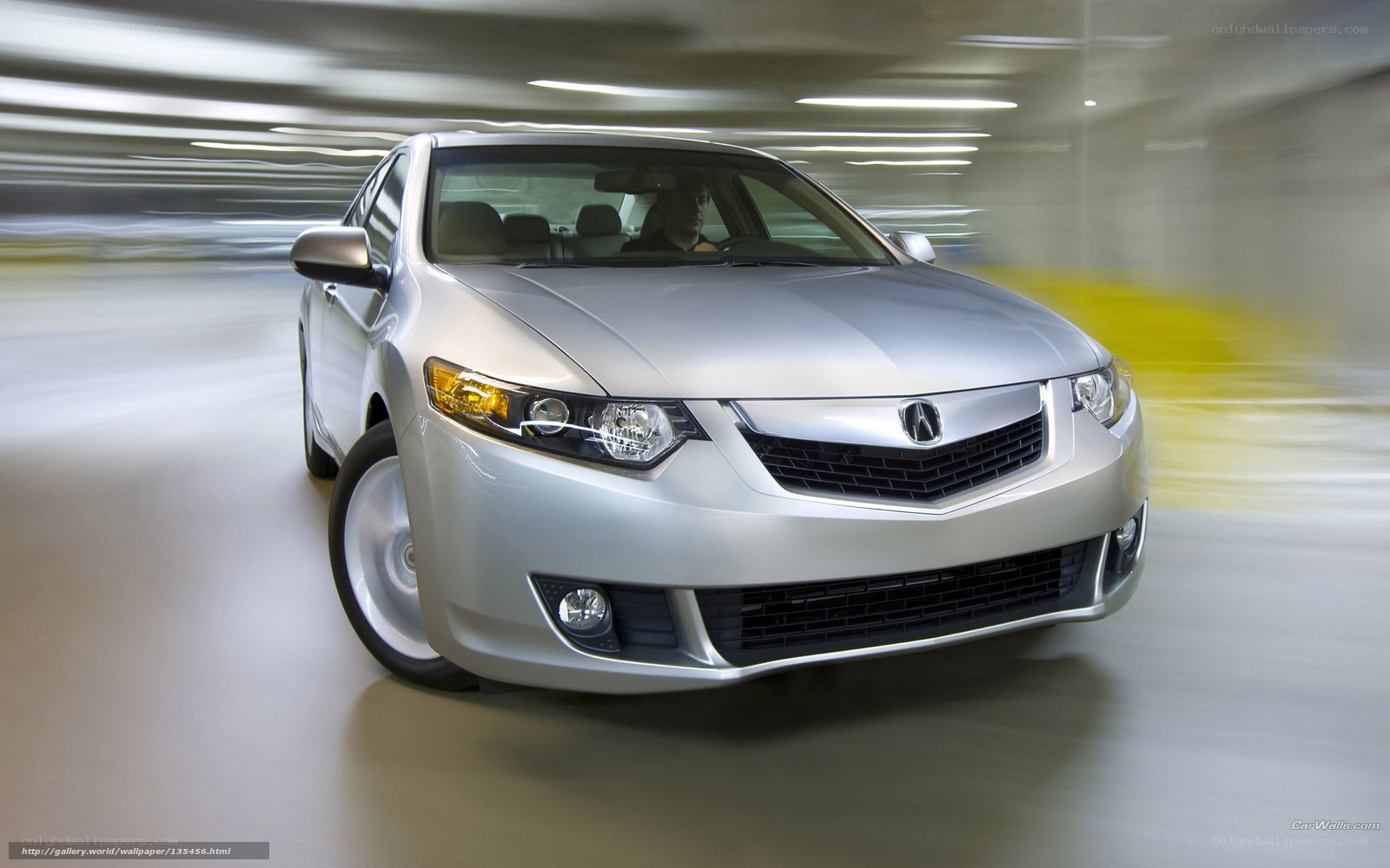 silver acura tsx in motion