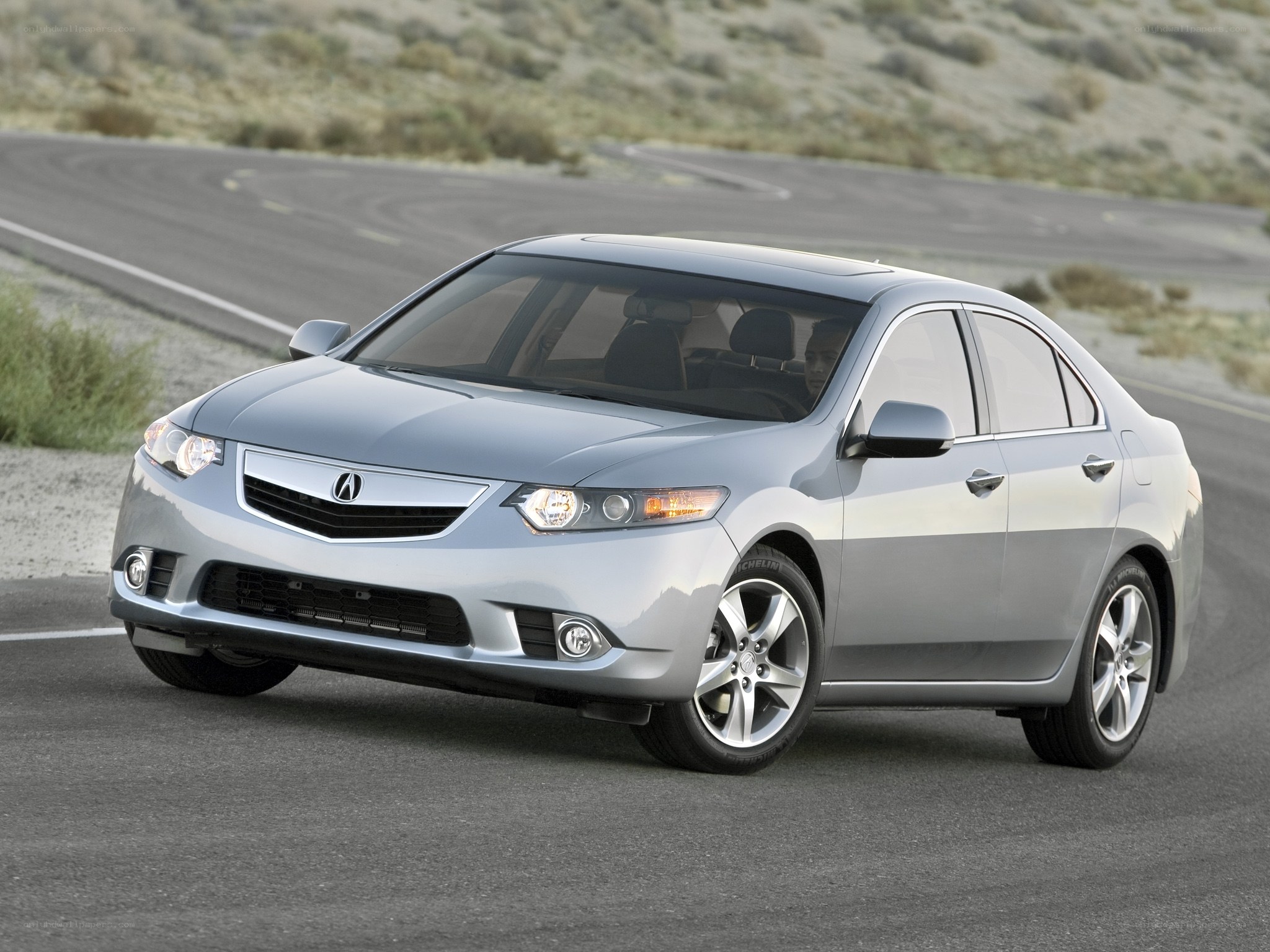 silver acura tsx on road