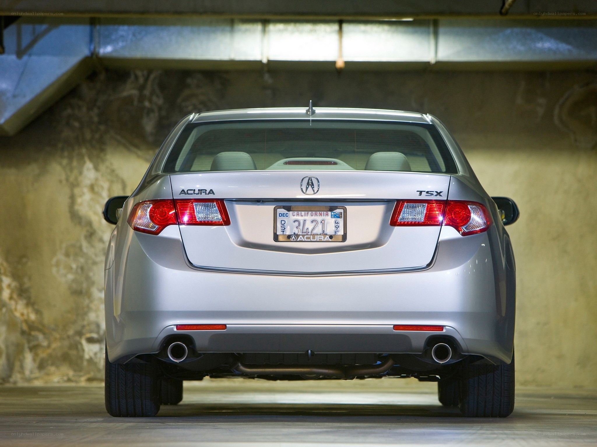 Silver Acura TSX rear view