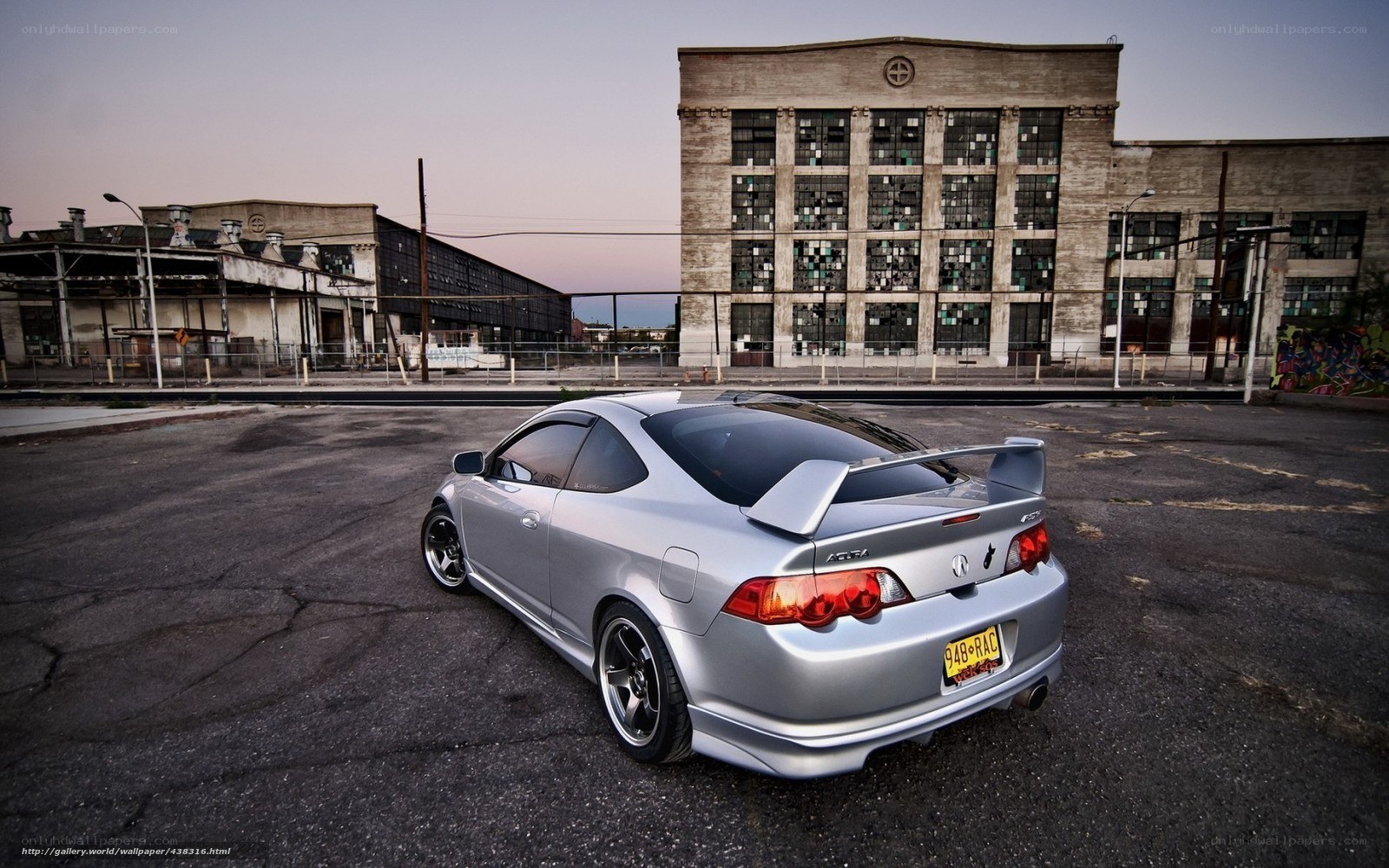 Silver Acura Type S in industrial lot