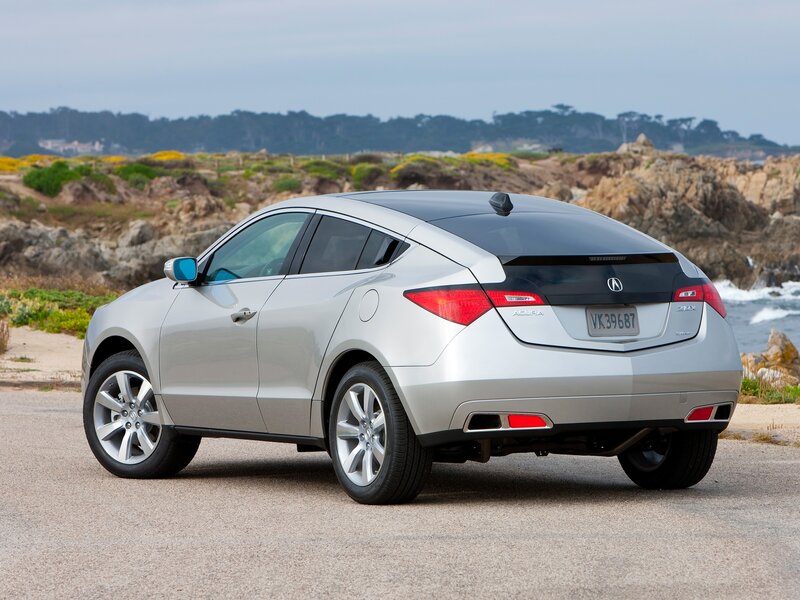 Silver Acura ZDX by the coast