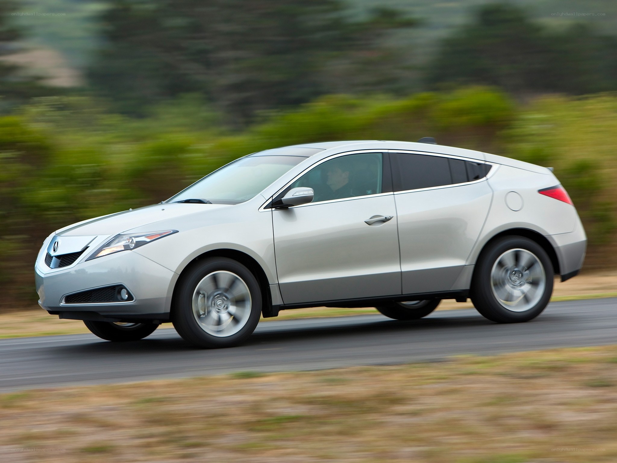 silver acura zdx in motion