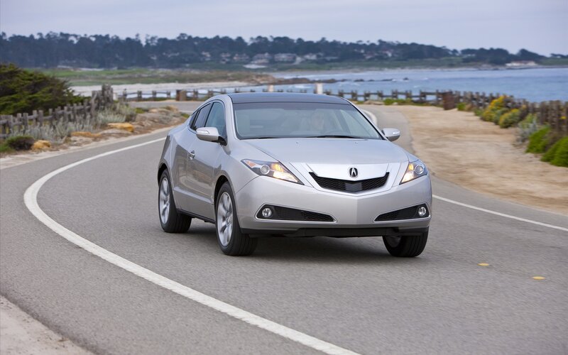 silver acura zdx on coastal road