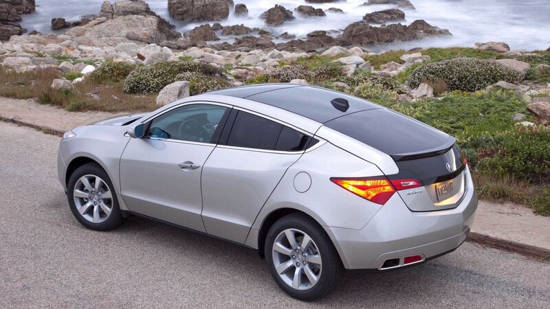 silver acura zdx on coastal road