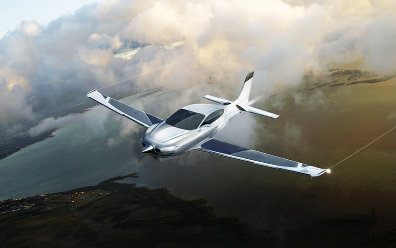 Silver Aircraft in Flight — Dramatic