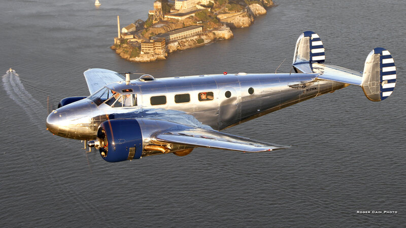 Silver Airplane Flying — Dramatic