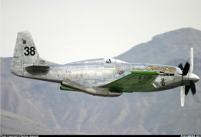 Silver Airplane in Flight — Dynamic, Photograph