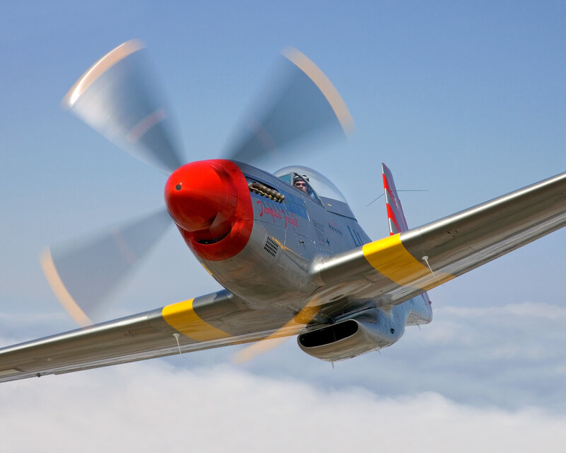 Silver Airplane in Flight — Dynamic