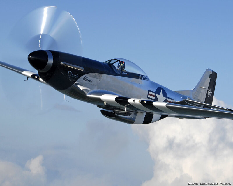 Silver Airplane in Flight