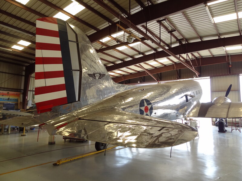 Silver Airplane in Hangar — Calm