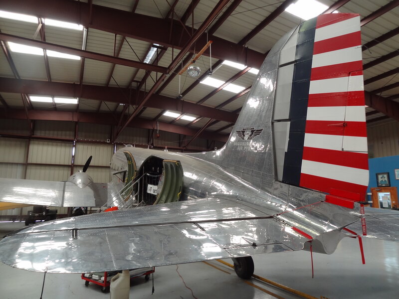 Silver Airplane in Hangar — Neutral, Photograph