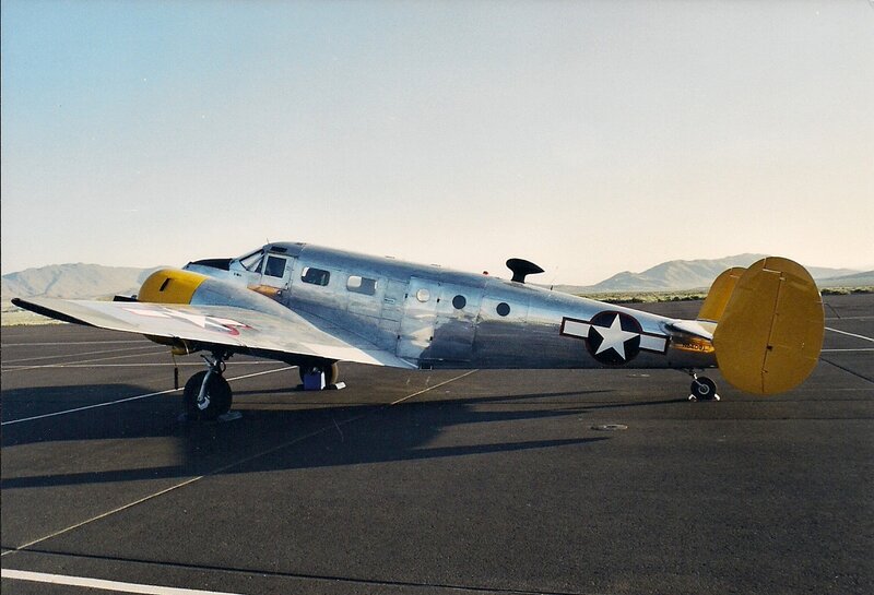 Silver Airplane on Tarmac — Gray, Calm, Afternoon, Photograph