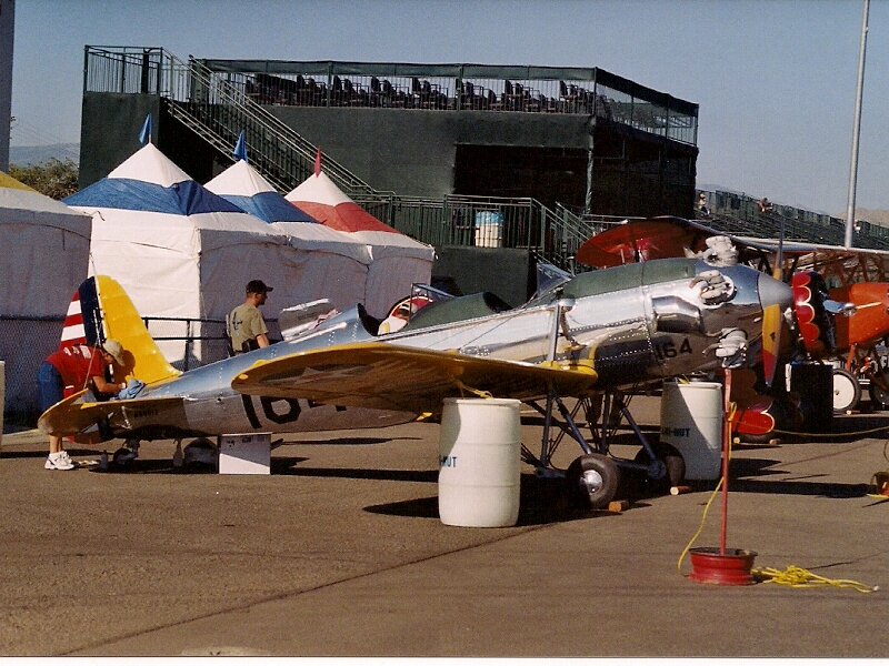 Silver Airplane on Tarmac — Gray, Outdoor
