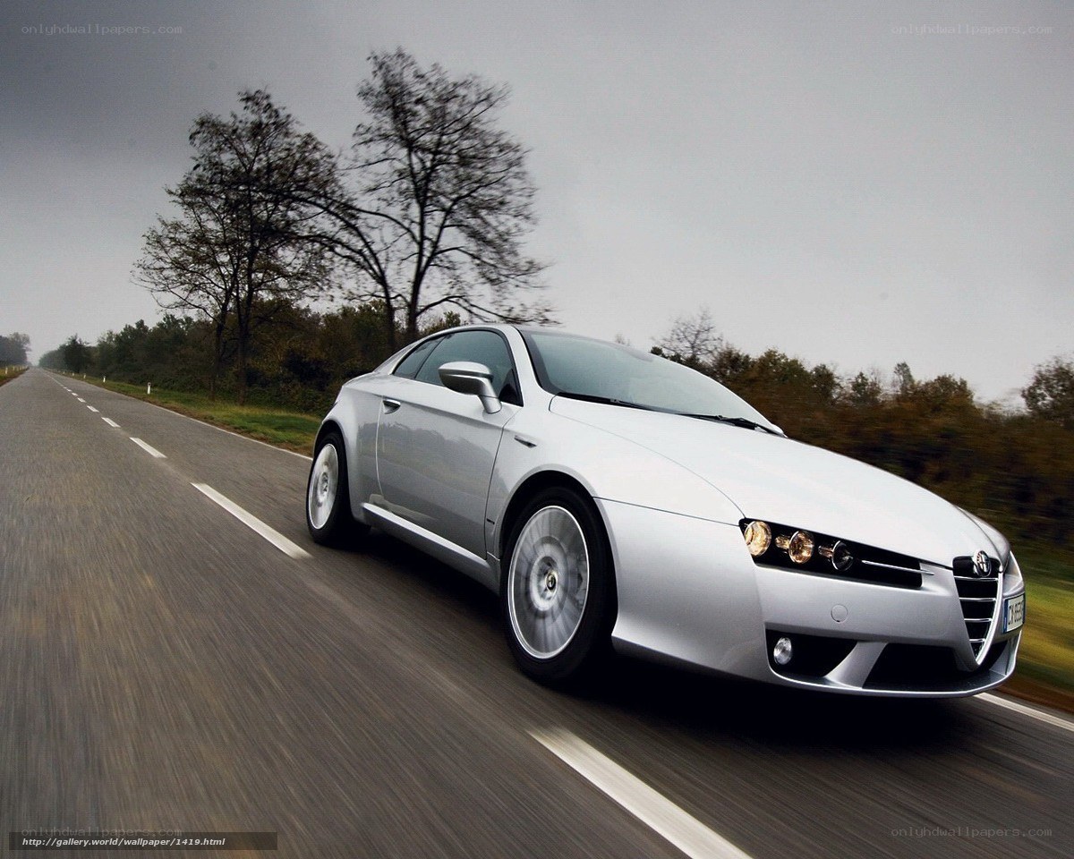 silver alfa romeo driving on road