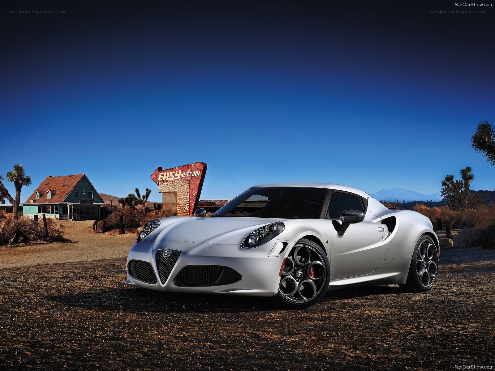 Silver Alfa Romeo in desert