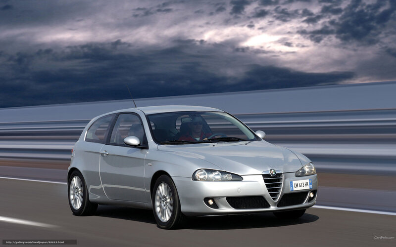 silver alfa romeo in motion