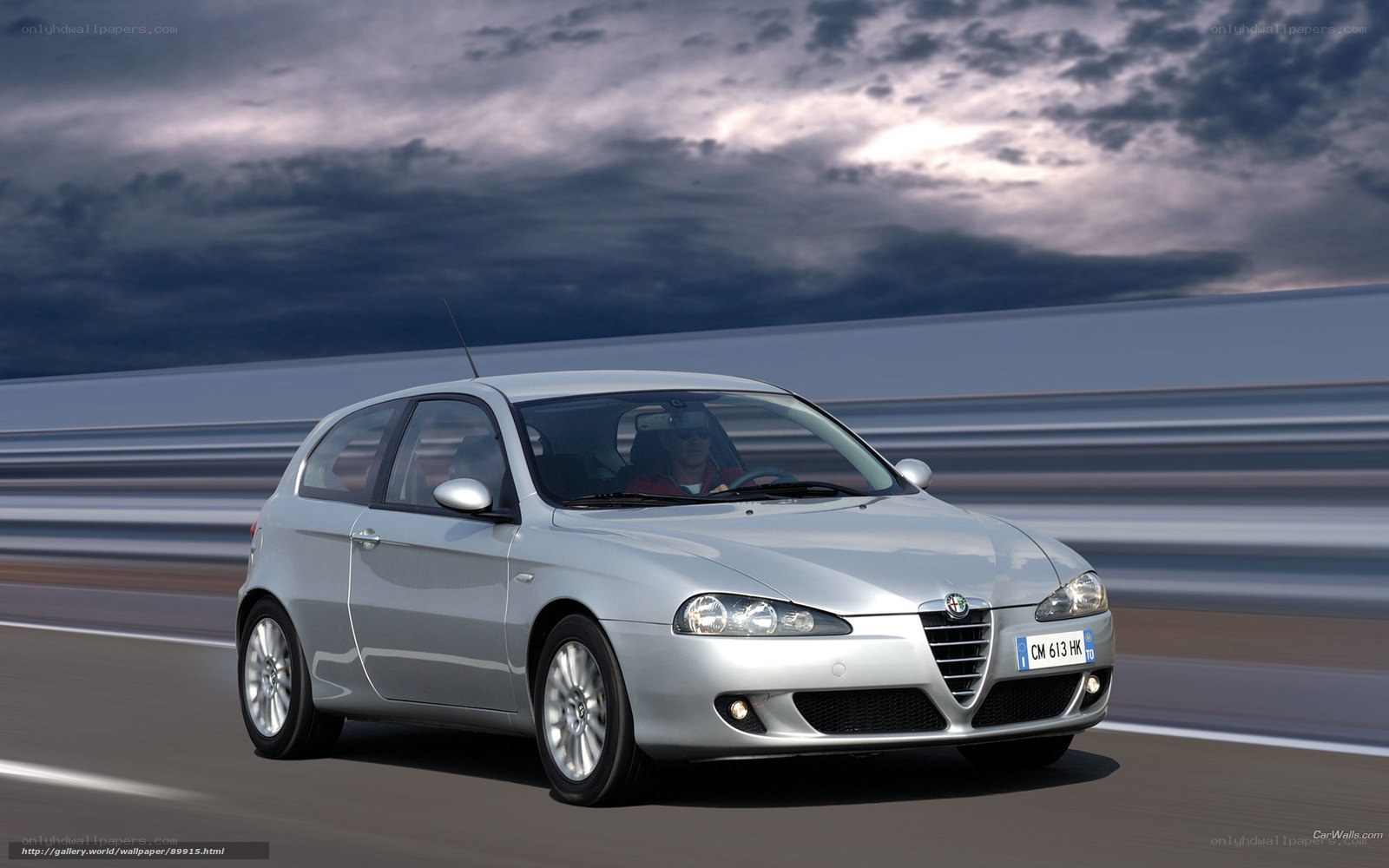 silver alfa romeo in motion