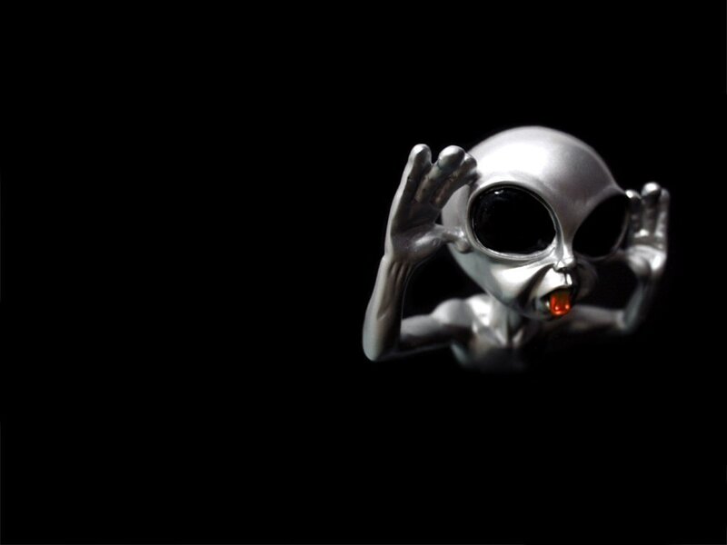 silver alien figurine