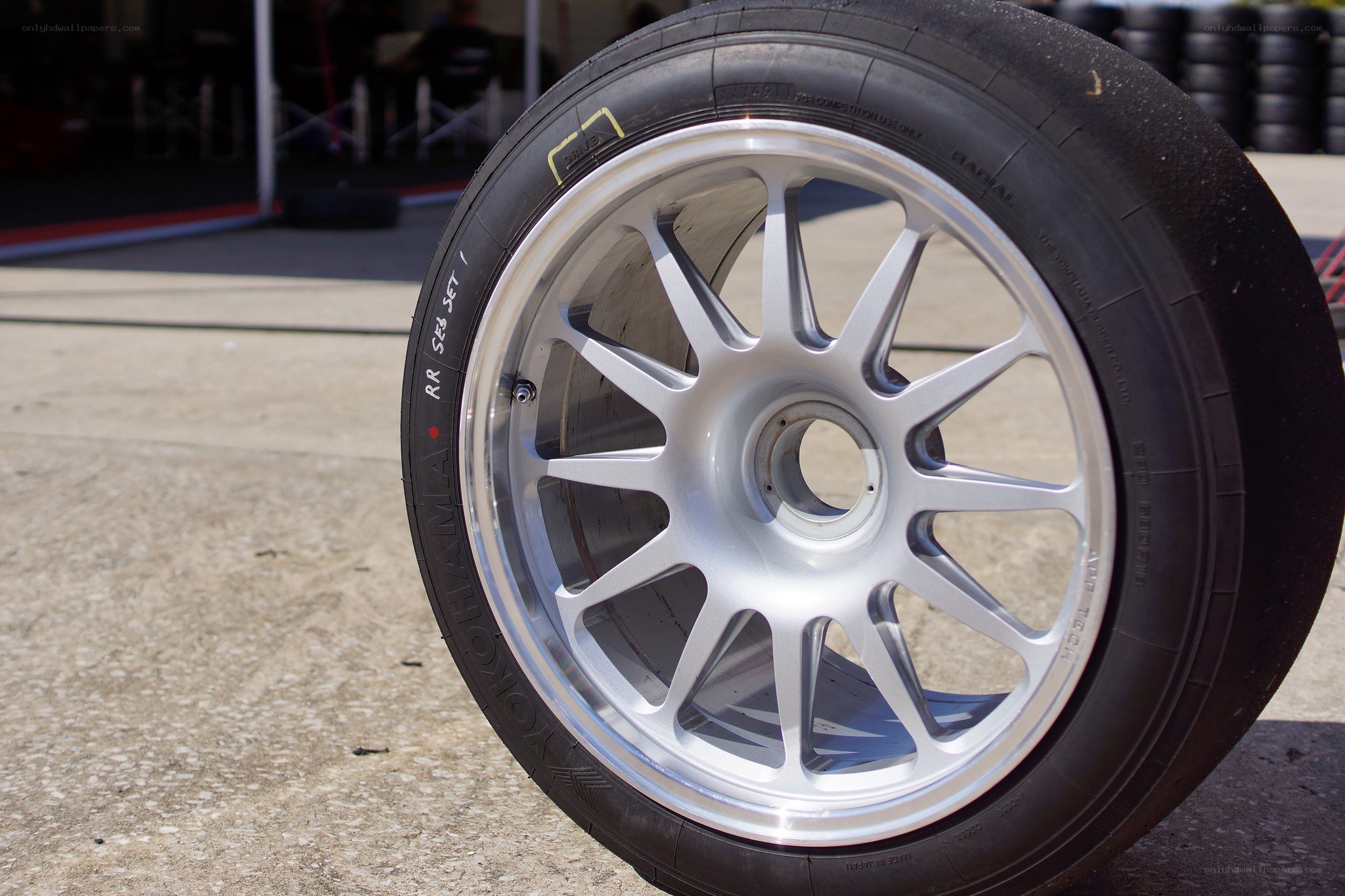 silver alloy wheel with tire