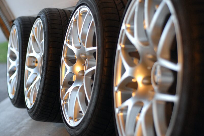silver alloy wheels in a row