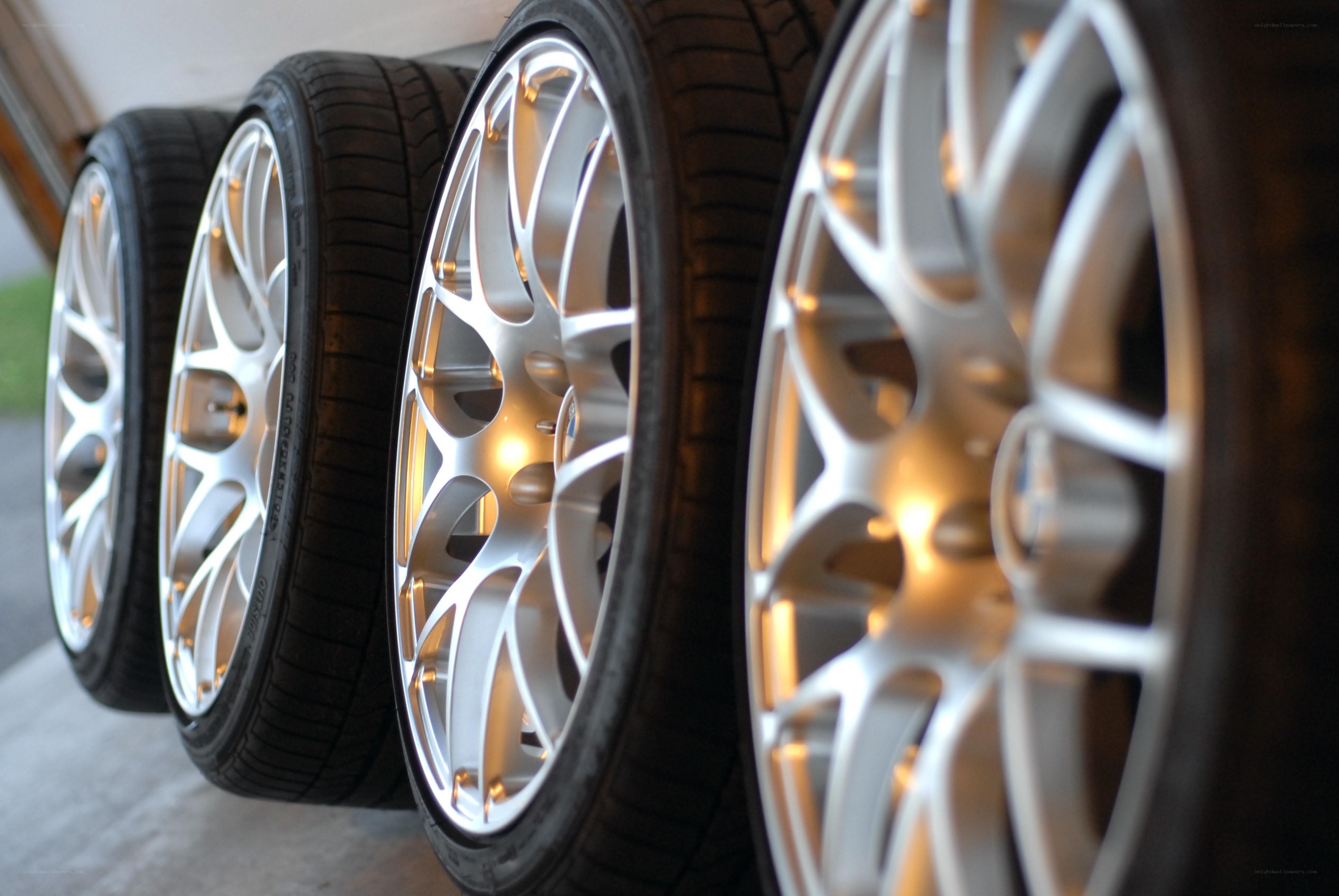 silver alloy wheels in a row