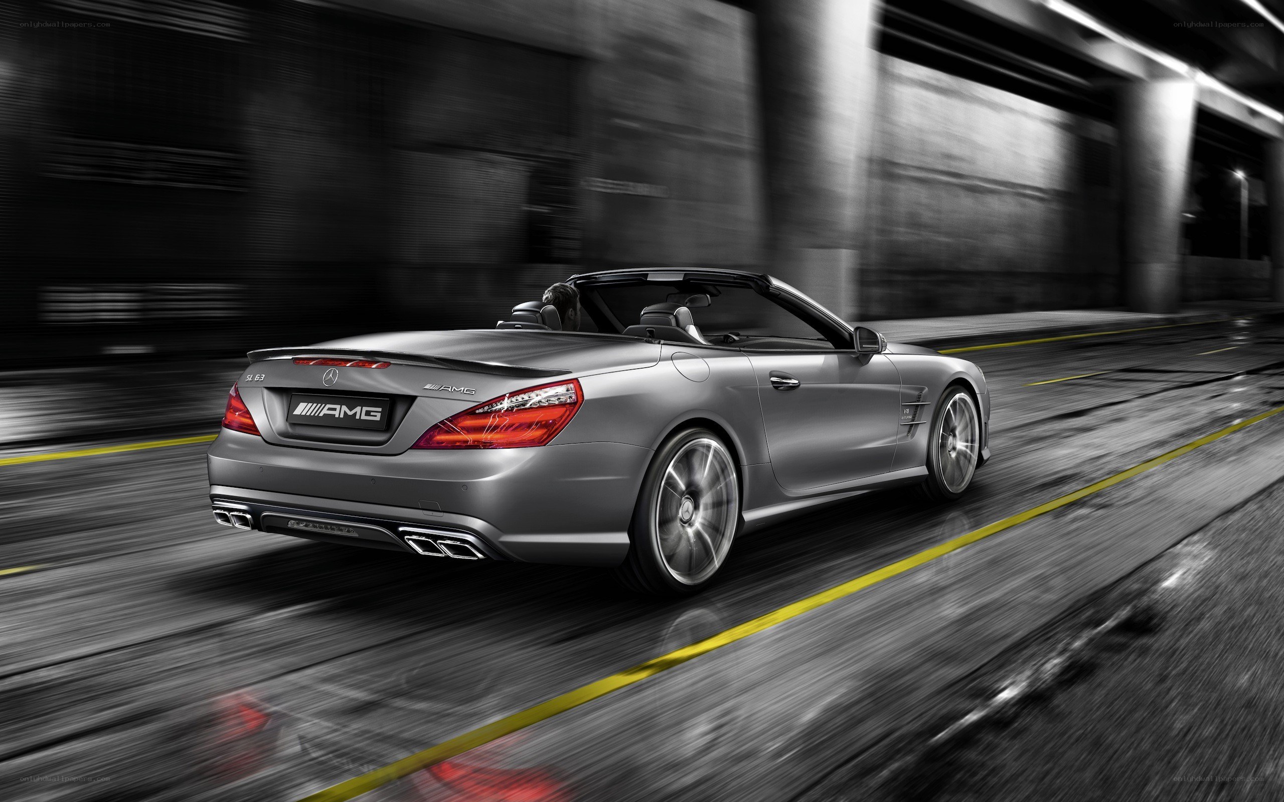 Silver AMG convertible in motion