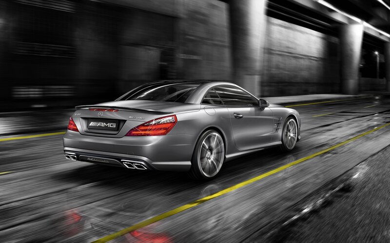Silver AMG sports car in motion