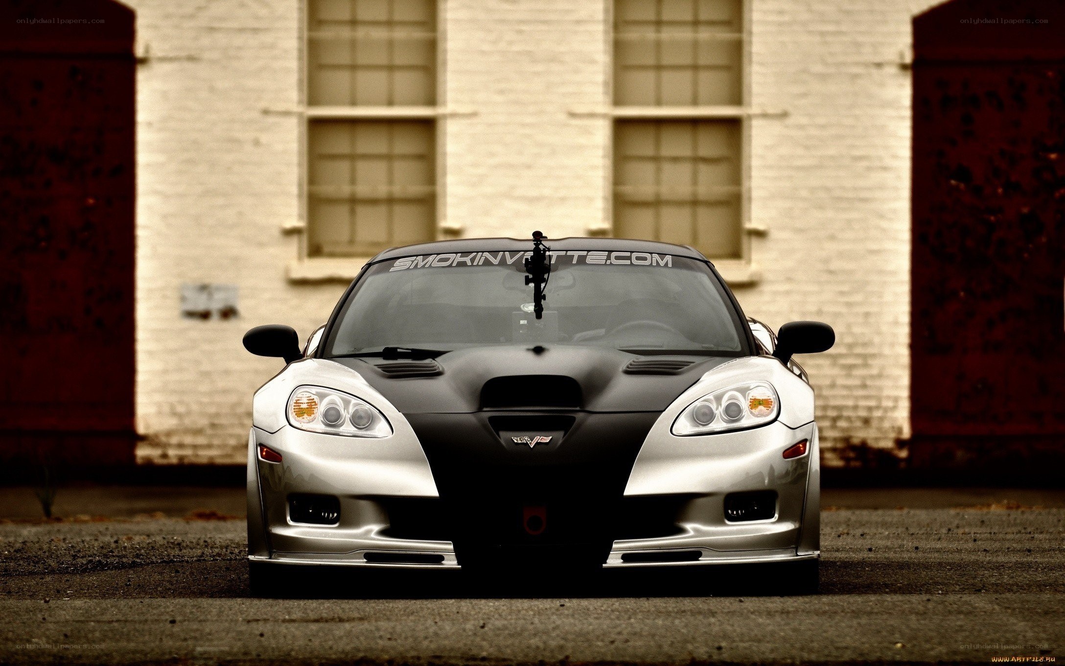 silver and black corvette car