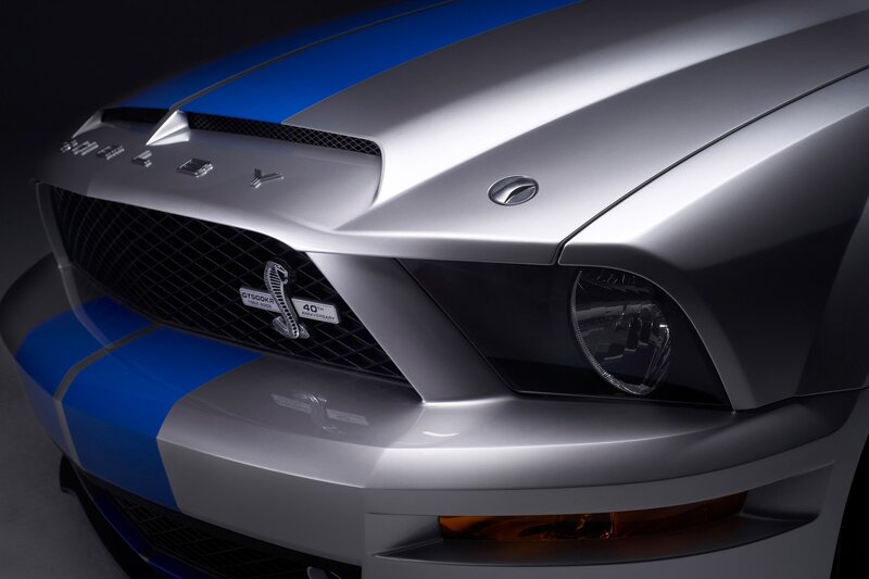 Silver and Blue Car — Dramatic, Photograph, Grille