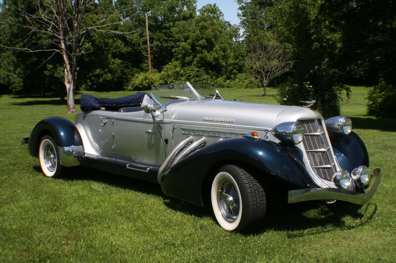 Silver and Blue Vintage Car