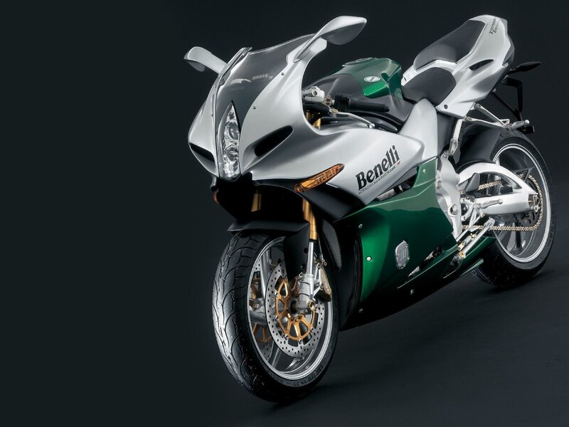 Silver and green Benelli motorcycle
