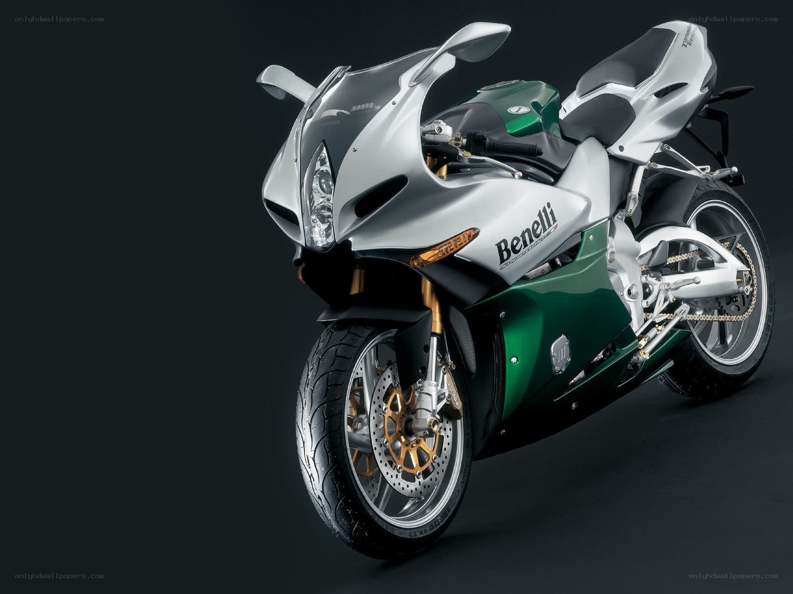 Silver and green Benelli motorcycle