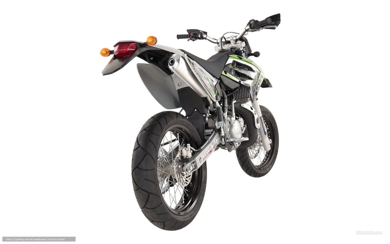silver and green dirt bike