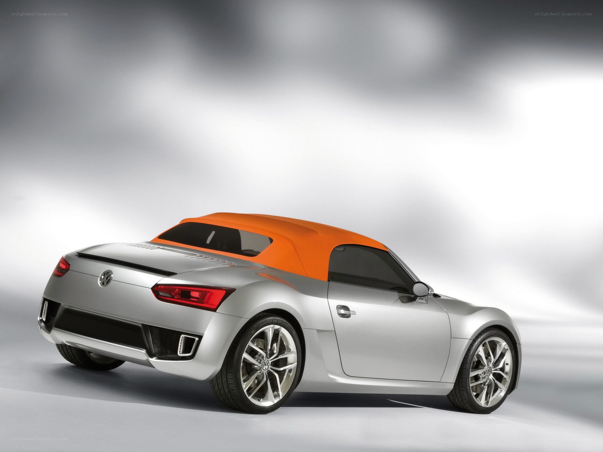 Silver and orange convertible car