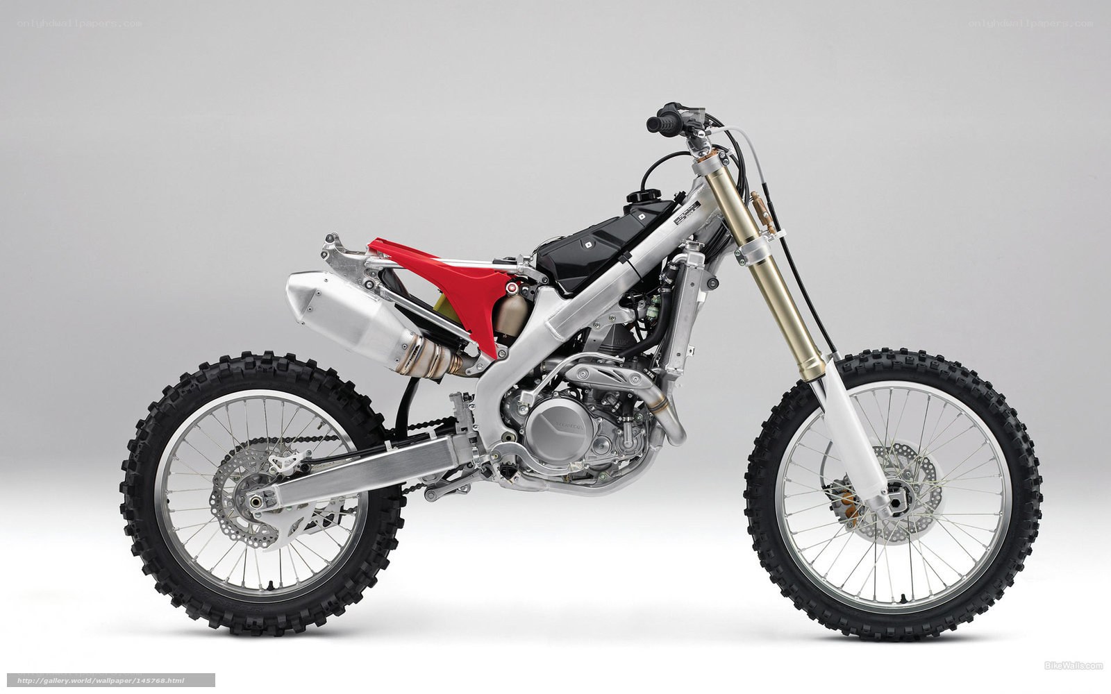 silver and red dirt bike