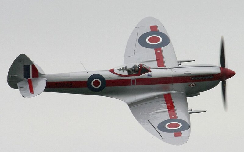 Silver and Red Fighter Plane — Gray