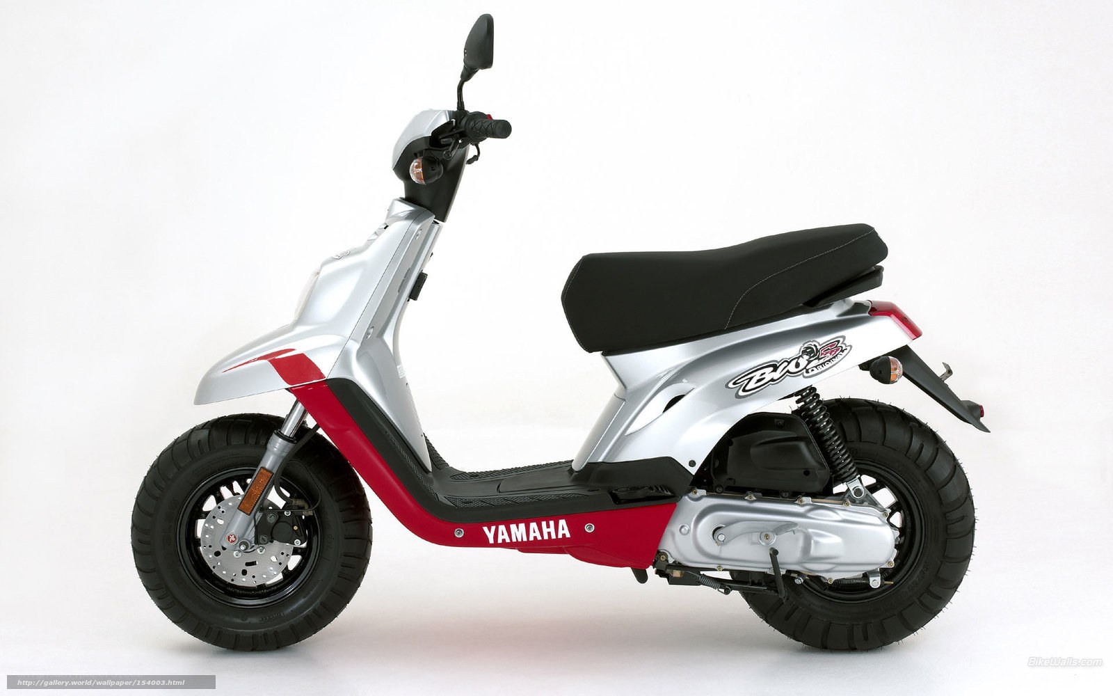 Silver and red Yamaha scooter
