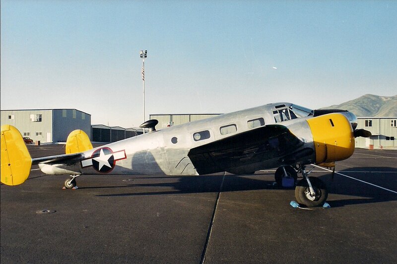 Silver and Yellow Airplane — Gray