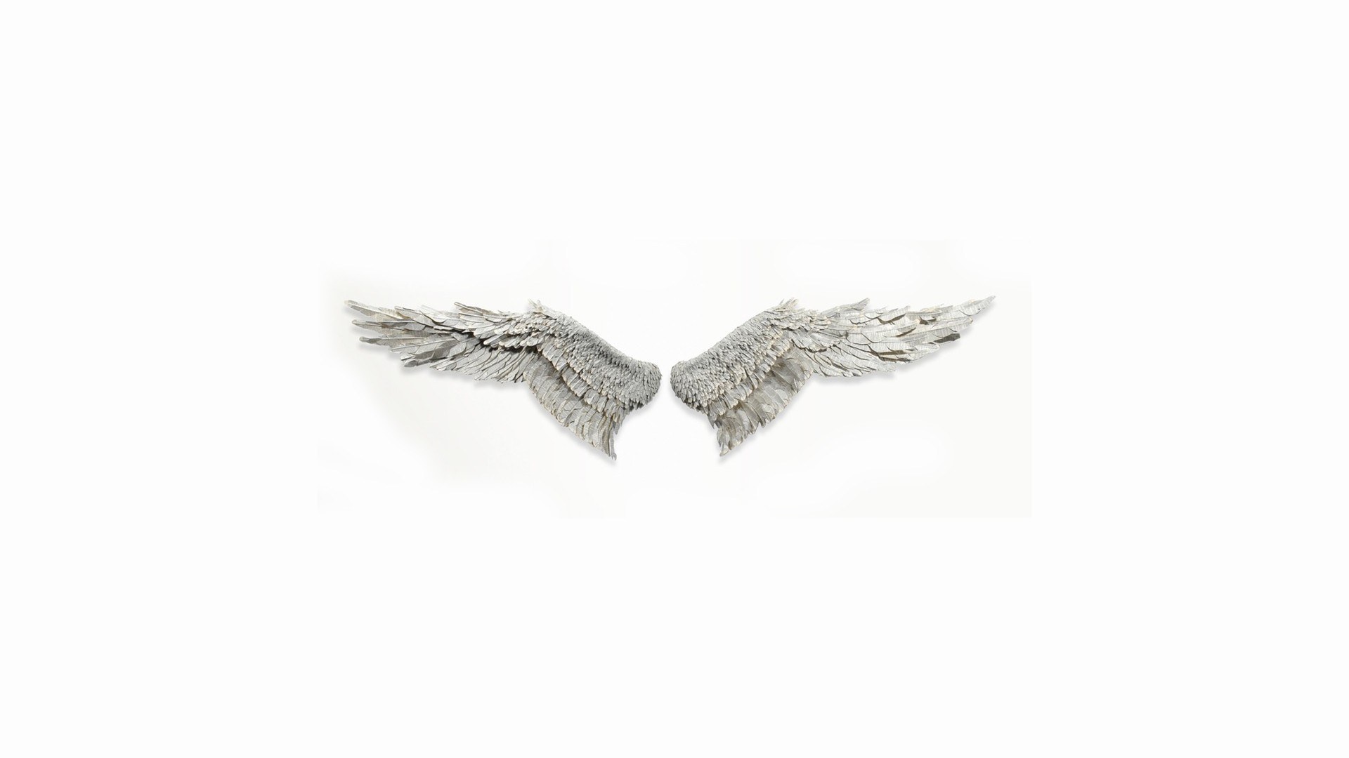 silver angel wings sculpture