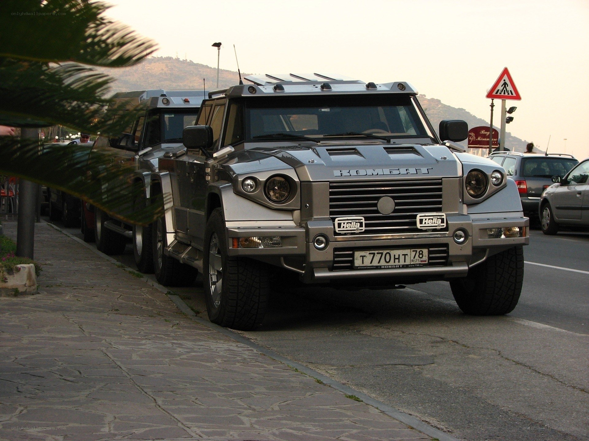 Silver armored vehicles on street