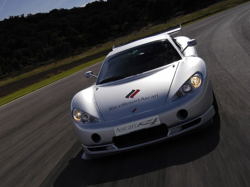 Silver Ascari KZ1 on a racetrack