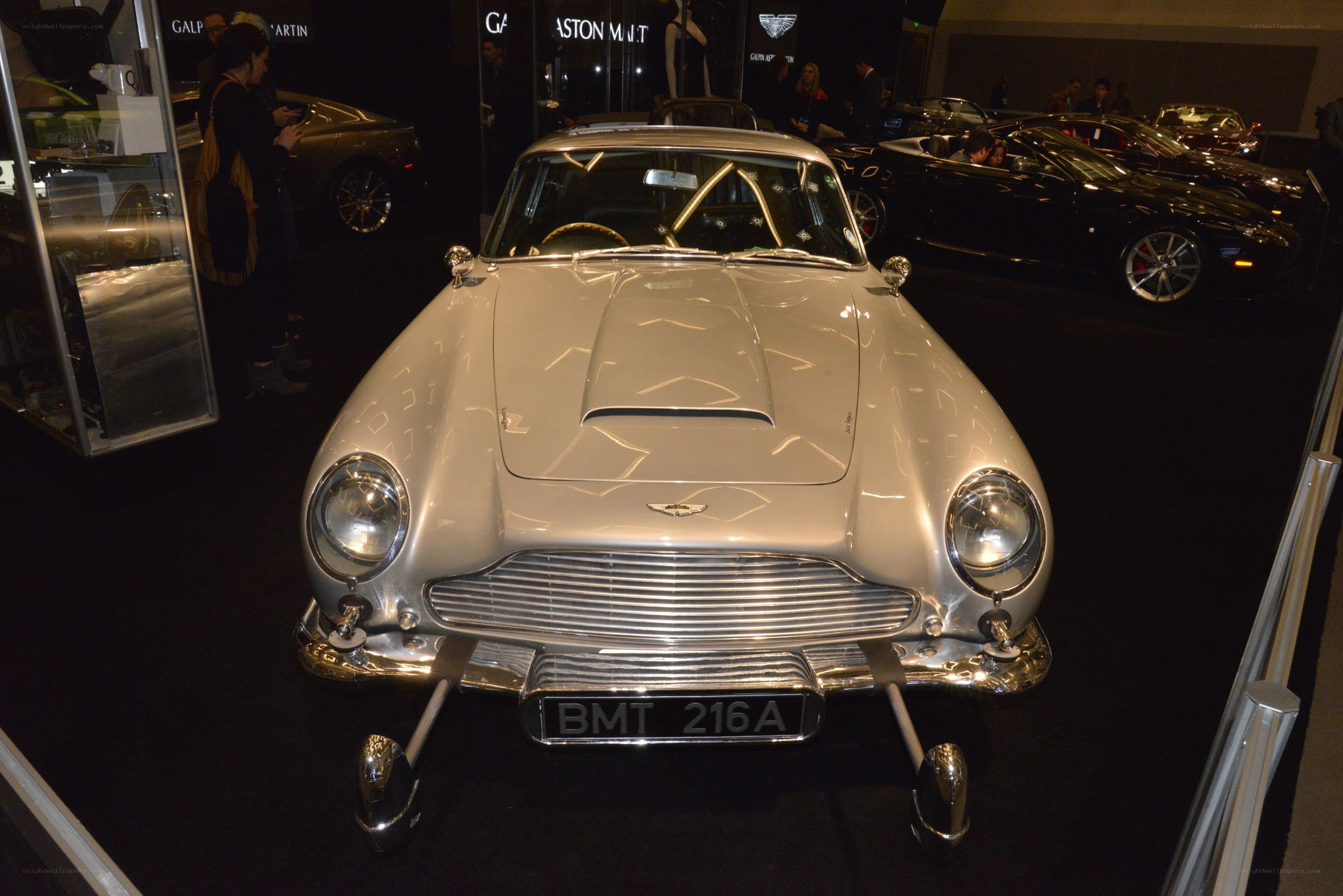 Silver Aston Martin at car show