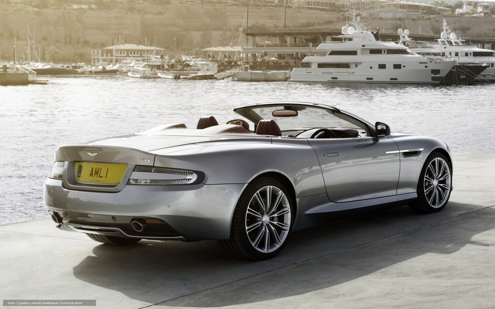 Silver Aston Martin at marina