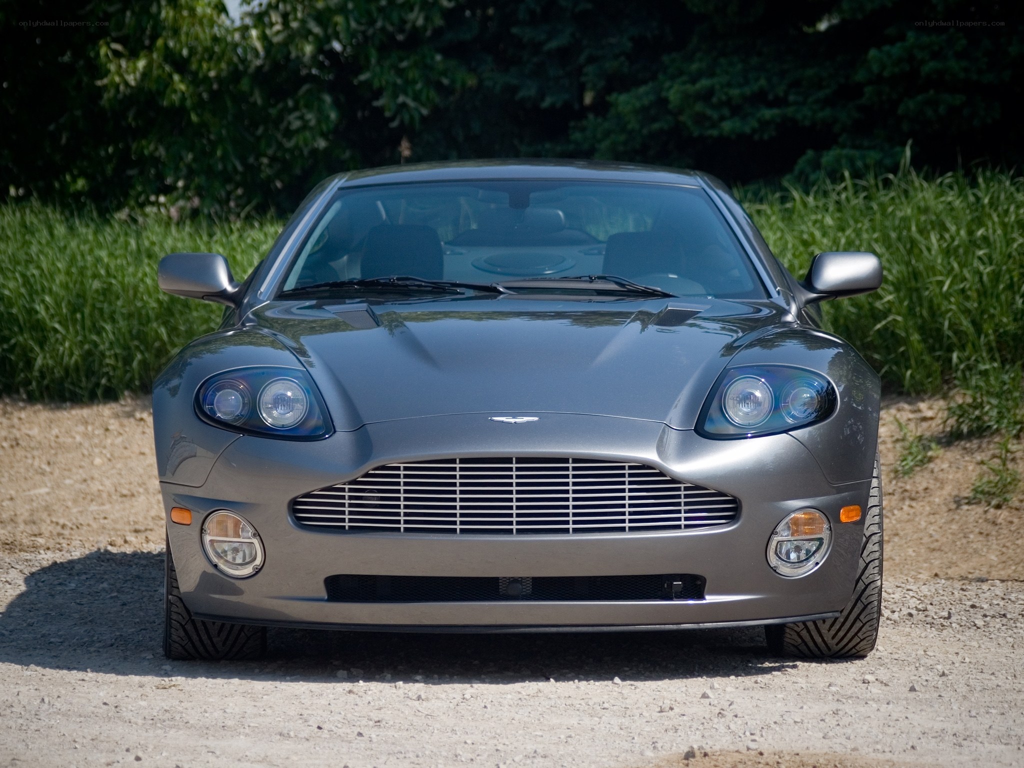 silver aston martin car