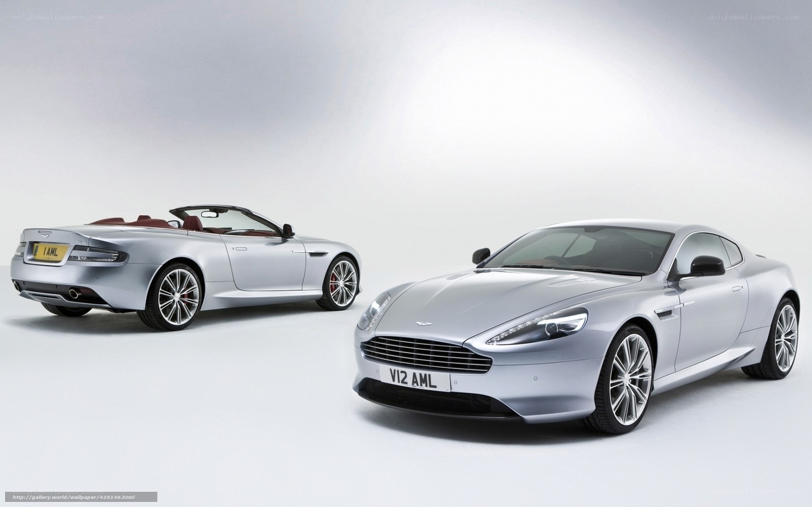 Silver Aston Martin cars
